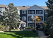 Thumbnail 2 of 20 - an apartment building with a sidewalk in front of it