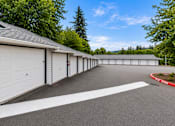 Thumbnail 22 of 23 - A long row of garage doors are closed.
