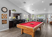 Thumbnail 5 of 12 - play a game of pool in our clubhouse at our apartments