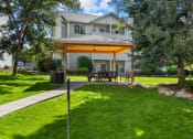 Thumbnail 6 of 34 - a covered patio in front of a house