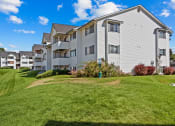 Thumbnail 24 of 32 - Farr Court Building Exterior and Green Grass