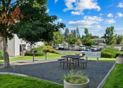 Thumbnail 19 of 32 - Farr Court Exterior Building Green Grass and Picnic Area