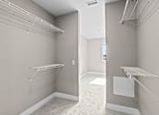 Thumbnail 30 of 48 - a spacious walk in closet in a 555 waverly unit