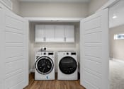 Thumbnail 16 of 48 - our apartments offer a laundry room with washer and dryer