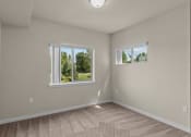 Thumbnail 18 of 45 - a bedroom with two windows and a carpeted floor