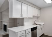 Thumbnail 26 of 39 - Novela Apartments Kitchen Counter and Cabinets