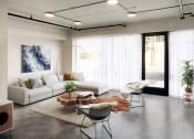 Thumbnail 13 of 29 - Geo Staged Living Room with Sofa and Large Windows