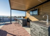 Thumbnail 13 of 22 - Rooftop Patio with BBQ's at Koi Apartments, Washington