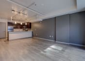 Thumbnail 21 of 22 - Living Room and Kitchen at Koi Apartments, Seattle, Washington