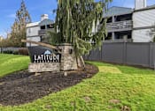 Thumbnail 8 of 20 - A garden with a sign that says Latitude.