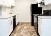 Thumbnail 22 of 39 - Novela Apartment Homes Kitchen Counters and Cabinets