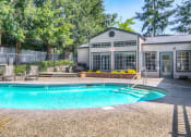 Thumbnail 15 of 39 - Novela Apartment Homes Shimmering Pool in Daytime