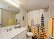 Thumbnail 6 of 39 - a bathroom with a sink toilet and shower