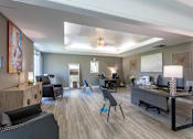 Thumbnail 10 of 14 - A modern office space with a variety of furniture and decor.