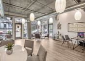 Thumbnail 17 of 29 - A modern office space with a view of the street outside the windows.