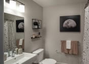 Thumbnail 17 of 33 - a small bathroom with a toilet sink and shower