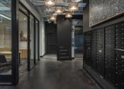 Thumbnail 7 of 33 - a view of the hallway with lockers and a sign that reads fta company tower