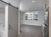 Thumbnail 25 of 33 - a bathroom with a shower stall and a bathtub