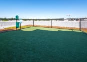 Thumbnail 12 of 21 - a fenced in batting cage with green turf and a scoreboard at Wilcox, Seattle, Washington, 98107