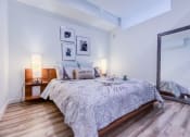 Thumbnail 17 of 21 - a bedroom with a large mirror and a bed at Wilcox, Seattle, Washington