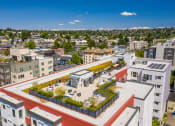Thumbnail 14 of 21 - a rendering of an aerial view of a city with buildings and a courtyard at Wilcox, Washington