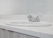 Thumbnail 28 of 34 - a white bathroom sink with a silver faucet