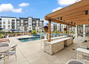 Thumbnail 15 of 35 - the reserve at city center apartments patio and pool area