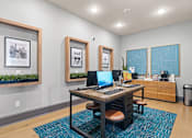 Thumbnail 47 of 92 - A room with a desk and a computer on it.