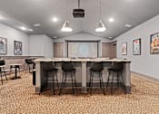 Thumbnail 66 of 92 - A conference room with a long table and chairs.