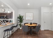 Thumbnail 6 of 92 - Water Oak Apartments in Austin, Texas Model Dining Area and Kitchen