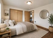 Thumbnail 5 of 36 - A bedroom with a bed, a plant, and a round mirror on the wall.