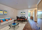 Thumbnail 9 of 36 - Parc East Apartments Staged Living Room and Dining Room