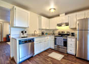 Thumbnail 7 of 36 - Parc East Apartments Staged Kitchen