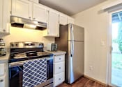 Thumbnail 10 of 36 - Parc East Apartments Staged Kitchen