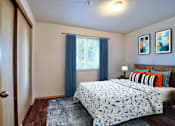Thumbnail 14 of 36 - Parc East Apartments Staged bedroom angle 3
