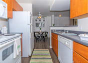 Thumbnail 4 of 14 - Port Royale Luxury Apartment Homes in Sierra Vista, Arizona Model Kitchen