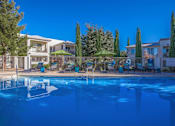 Thumbnail 10 of 14 - Port Royale Luxury Apartment Homes in Sierra Vista, Arizona Pool with Lounge Chairs