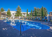 Thumbnail 9 of 14 - Port Royale Luxury Apartment Homes in Sierra Vista, Arizona Pool with Lounge Chairs