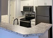 Thumbnail 2 of 14 - Port Royale Luxury Apartment Homes in Sierra Vista, Arizona Kitchen