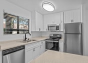 Thumbnail 6 of 33 - Sagecliff Apartments Model Kitchen