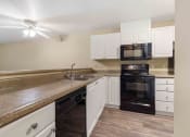 Thumbnail 13 of 20 - Saratoga Apartments in Everett, Washington Kitchen