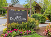 Thumbnail 33 of 43 - a sign that says welcome to evans creek at woodbridge