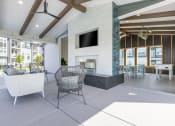 Thumbnail 23 of 30 - the preserve at ballantyne commons living room with fireplace and furniture
