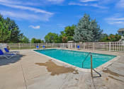 Thumbnail 27 of 34 - Sugar Pine Townhomes in Boise, Idaho Pool with Lounge Chairs