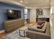 Thumbnail 20 of 39 - Lux Apartments Bellevue WA resident media lounge, microwave and mini fridge