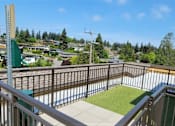 Thumbnail 19 of 39 - Lux Apartments Bellevue WA Rooftop pet run with pet station