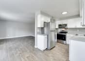 Thumbnail 3 of 19 - The Acres Model Kitchen and Living Room