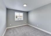 Thumbnail 10 of 19 - The Acres Bedroom with Carpet