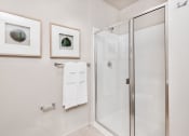 Thumbnail 17 of 36 - bathroom with a glass shower and two pictures on the wall at The Hayes on Stone Way, Washington, 98103