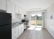 Thumbnail 1 of 11 - The Mark Apartments in Hayward, California Kitchen with Private Patio